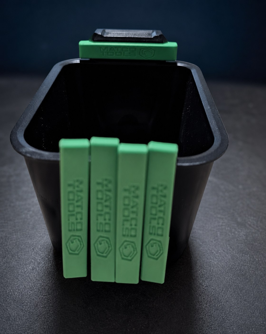 Replacement clips installed on a bin