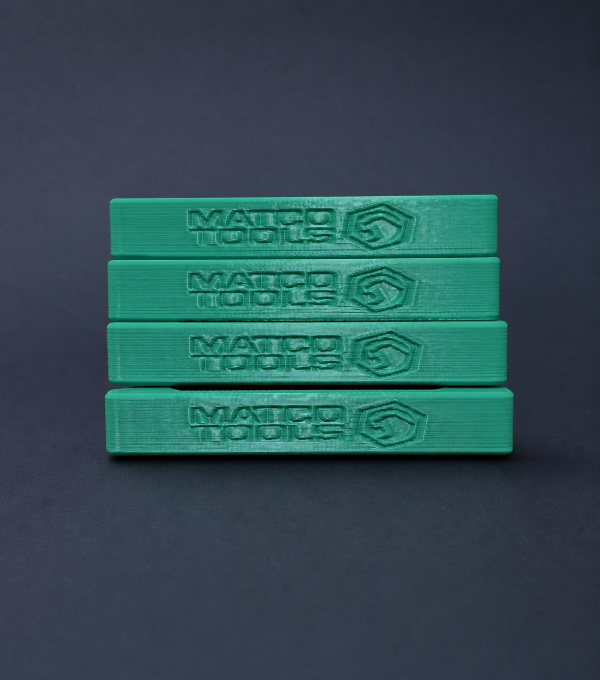 Set of four green Matco toolbox replacement clips